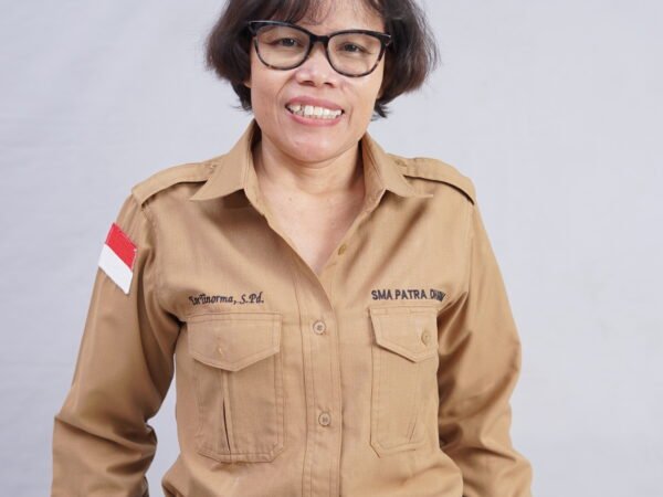 Eve Tinorma SImatupang, S.Pd.
